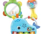a baby toy that is sitting next to a mirror