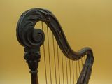 a close up of a harp on a table