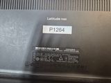 the back of a laptop with a sticker on it that says latitude 7400