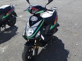 two motorcycles that are parked in the parking lot
