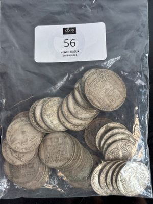 a bag full of coins sitting on a table