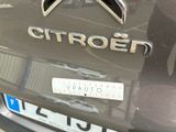 a close up of a car badge on the back of it