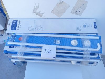 a stack of blue and white pipes sitting on top of a box