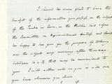 gros plan d'une lettre écrite à la main sur un morceau de papier