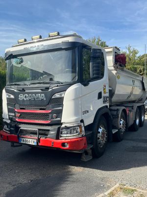 a large truck that is parked on the side of the road