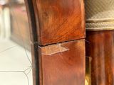 a close up picture of a broken clock on a table