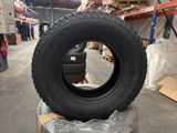 tires stacked on top of each other in a warehouse