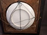 a white plate that is on top of a wooden box