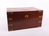 an old wooden box with brass hardware on the sides
