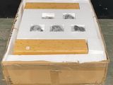 a cardboard box that has a picture of a man on it
