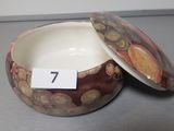 a small bowl with a lid that has a number on it