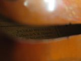 a close up of a bottle of wine with a label on it