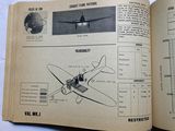 an open book with a picture of a plane on it