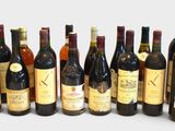 many bottles of wine lined up in a row