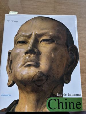 a book with a picture of a man ' s face on it