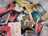 a bag full of books sitting on the floor