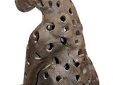 a sculpture of a cheetah sitting on its hind legs