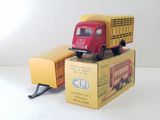 a toy truck that is sitting on top of a box