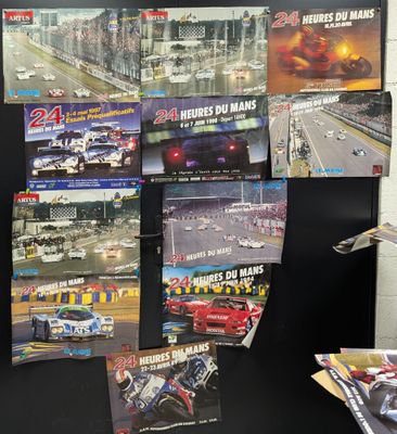 a bunch of posters on the wall of a room
