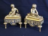 pair of antique brass figurines of a boy and a girl on a bench