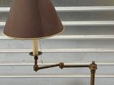 a lamp that is sitting on a table next to a window
