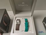 a box with a watch inside of it and a box with a watch inside of it