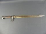 a small knife that is laying on a table
