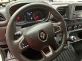 the interior of a car with a steering wheel and dashboard controls