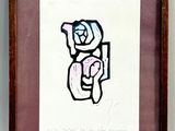 tableau encadré représentant un dessin d'une main tenant une rose rose