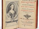 an open book with a picture of a woman in a dress