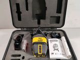 an open case with tools in it sitting on a table