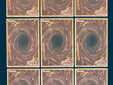 six square tiles with a gold swirl pattern on a blue background