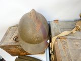 a helmet and other items sitting on a table