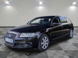 une image d'une audi wagon noire garée dans un garage