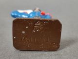 a piece of chocolate that is sitting on a table