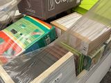 a box full of books sitting on top of a table