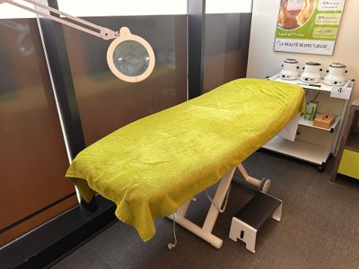 an ironing board sitting on a table in a room