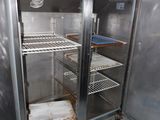 a refrigerator that has some food inside of it