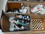 many boxes of assorted items sitting on the floor