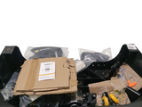 a box of tools sitting on top of a black box