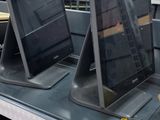 many computers on the shelves in the store