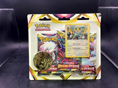 a close up of a box of pokemon cards on a table