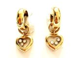 paire de boucles d'oreilles en forme de cœur en or jaune 18 carats et diamants