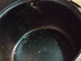 a close up of a pot with a lid on a table