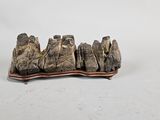 a piece of wood that is sitting on a table