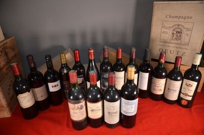 a lot of bottles of wine on a table