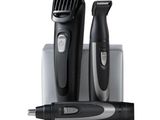 an image of a black electric shaver and a black and white pen