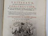 an open book with a picture of a man sitting in a chair