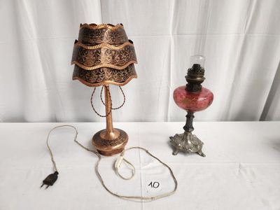 a lamp that is sitting on a table next to a lamp