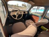 a small car with a steering wheel and a dashboard
